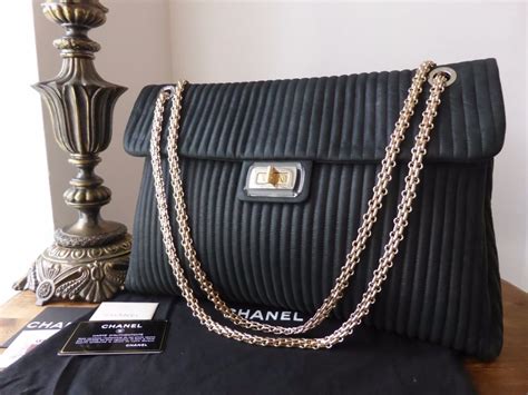 chanel vertical quilted bag|Chanel quilted reissue shoulder bag.